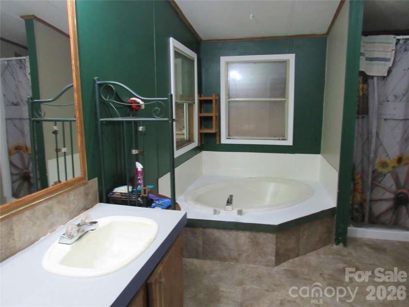 261 Warren Creek Road, Candler, NC 28715.  MLS# CAR4413970, YatesRealty ID 44536. 