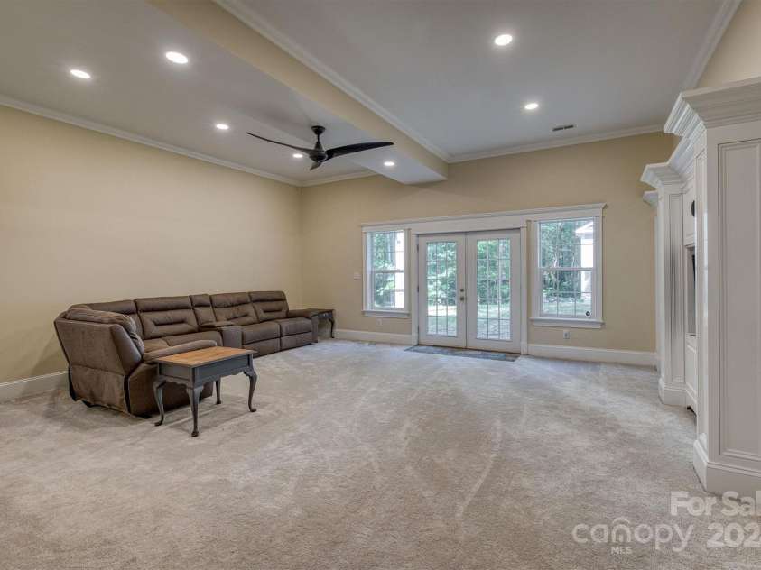 3670 West Bay Drive, Sherrills Ford, NC 28673.  MLS# CAR4158245, YatesRealty ID 4454. Basement large living Basement living area or rec room with built ins