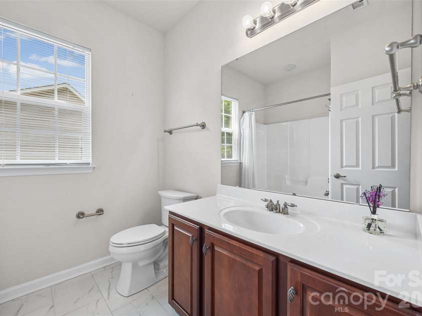 5914 Kirkwynd Commons Drive, Charlotte, NC 28278.  MLS# CAR4412989, YatesRealty ID 44542. Sharing a third full bedroom