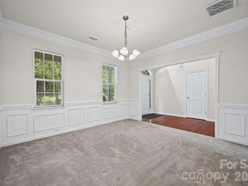 5914 Kirkwynd Commons Drive, Charlotte, NC 28278.  MLS# CAR4412989, YatesRealty ID 44542. With a beautiful front dining room