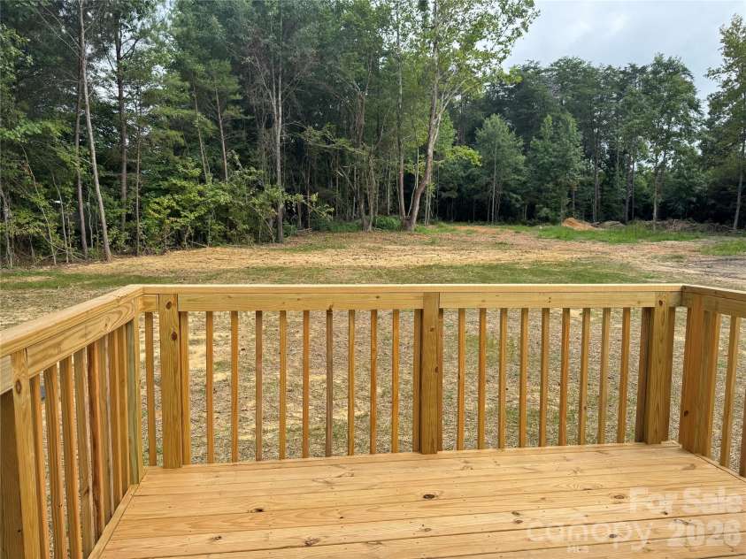 450 Brown Acres Road, Salisbury, NC 28146.  MLS# CAR4411690, YatesRealty ID 44553. Large back yard with a deck