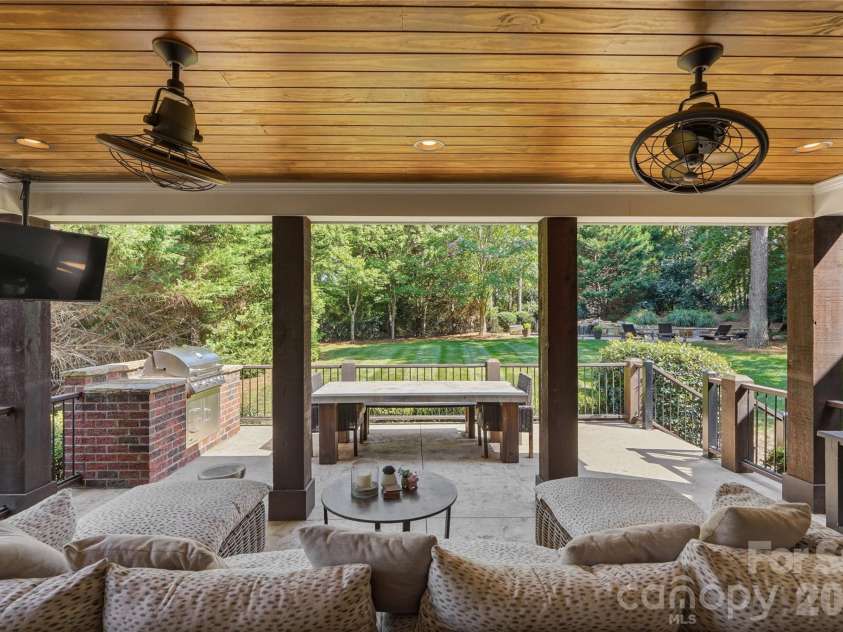 8403 Dunton Court, Waxhaw, NC 28173.  MLS# CAR4400840, YatesRealty ID 44556. Back Covered entertaining patio