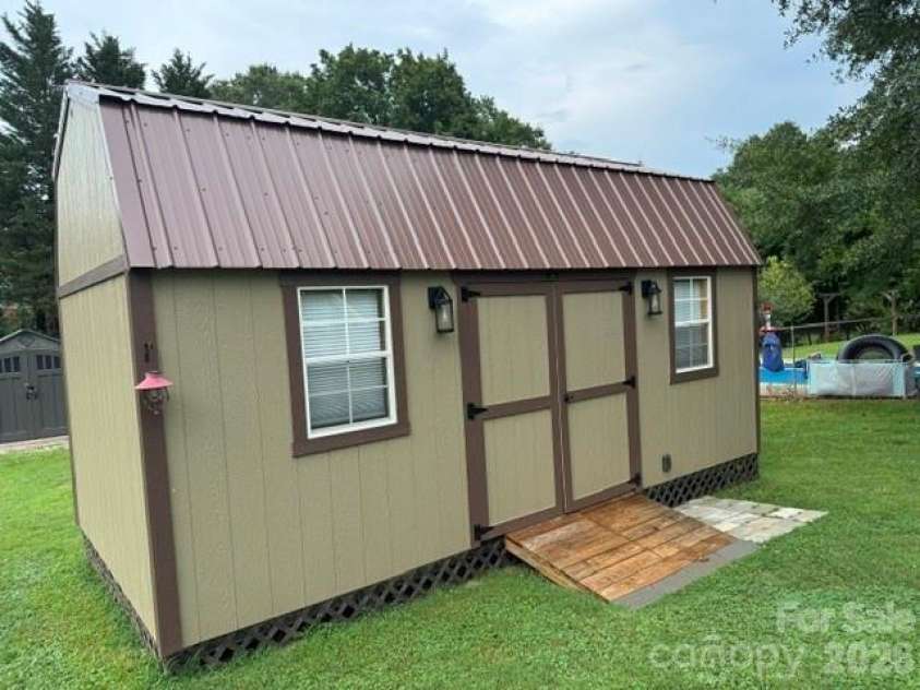 393 Arlington Street, Forest City, NC 28043.  MLS# CAR4414154, YatesRealty ID 44557. 10X20 bldg. is wired & insulated