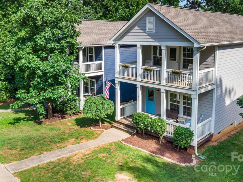 12304 Huntersville Concord Road, Huntersville, NC 28078.  MLS# CAR4268333, YatesRealty ID 4456. Double covered porches - enjoy from the living area and from the primary bedroom