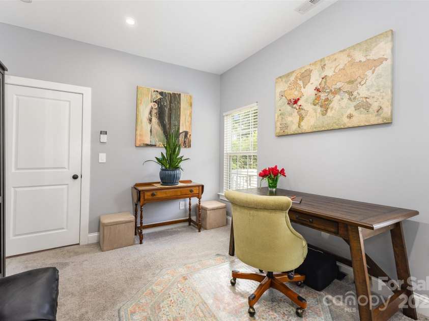 12304 Huntersville Concord Road, Huntersville, NC 28078.  MLS# CAR4268333, YatesRealty ID 4456. Main level bedroom that could be used for a guest room, office, or gym