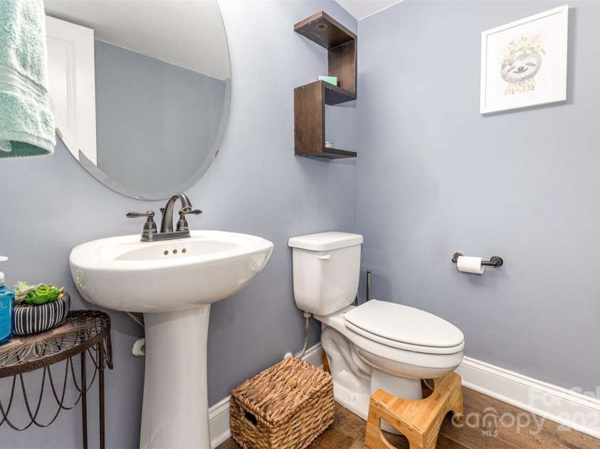 12304 Huntersville Concord Road, Huntersville, NC 28078.  MLS# CAR4268333, YatesRealty ID 4456. Main level powder room
