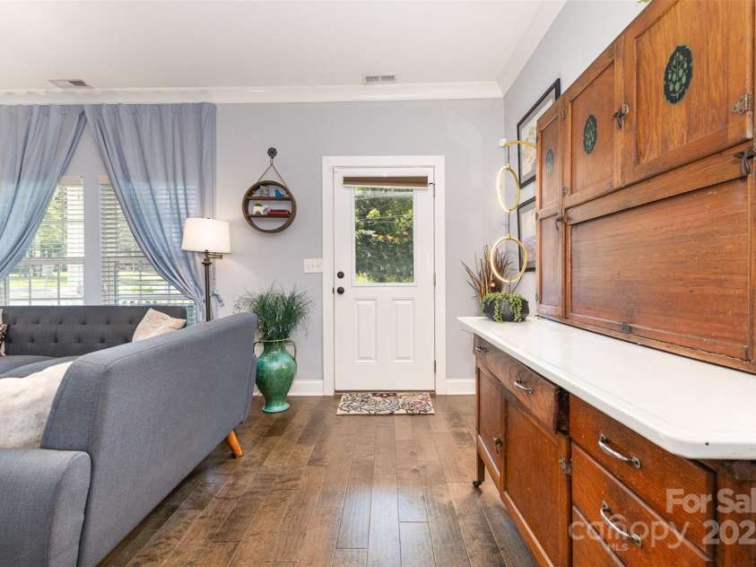 12304 Huntersville Concord Road, Huntersville, NC 28078.  MLS# CAR4268333, YatesRealty ID 4456. Open-concept living area, dining area, & kitchen welcomes you from the front porch