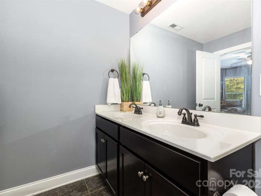 12304 Huntersville Concord Road, Huntersville, NC 28078.  MLS# CAR4268333, YatesRealty ID 4456. Primary bedroom's ensuite full bath
