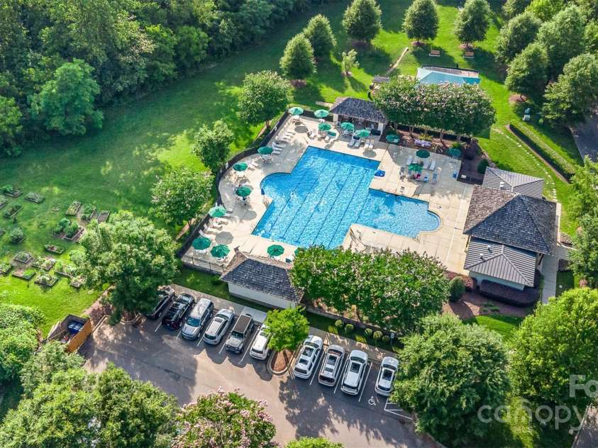 12304 Huntersville Concord Road, Huntersville, NC 28078.  MLS# CAR4268333, YatesRealty ID 4456. Resort-style Community pool, playground, and community garden