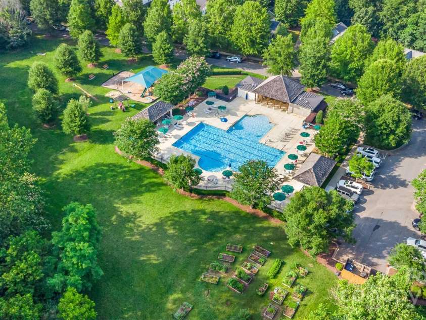 12304 Huntersville Concord Road, Huntersville, NC 28078.  MLS# CAR4268333, YatesRealty ID 4456. Resort-style Community pool, playground, and community garden