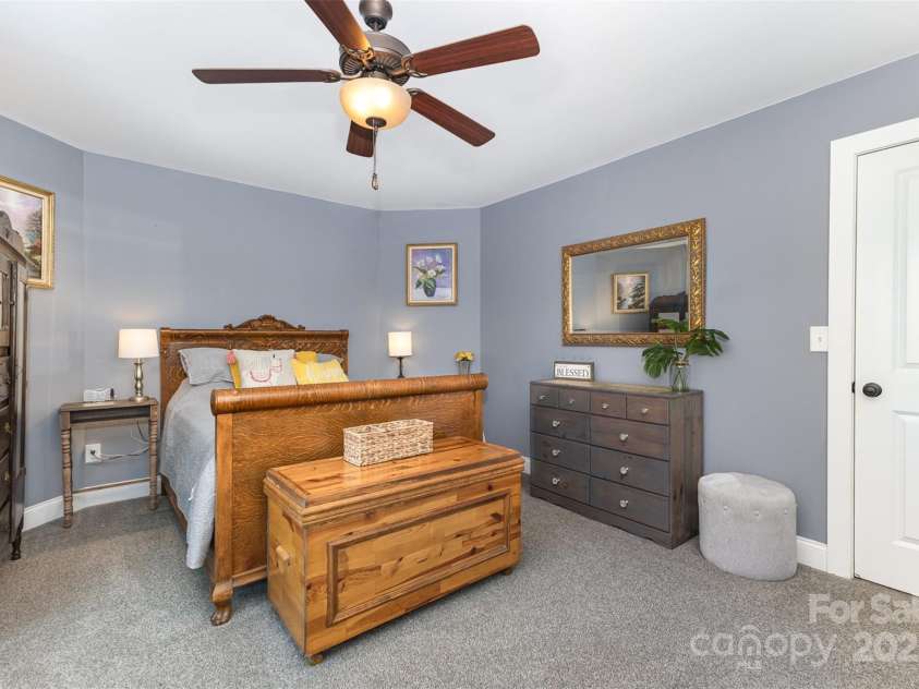12304 Huntersville Concord Road, Huntersville, NC 28078.  MLS# CAR4268333, YatesRealty ID 4456. Upper level guest bedroom with double door closet and large windows