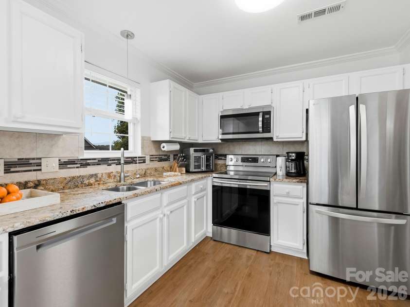 4402 Marble Way, Asheville, NC 28806.  MLS# CAR4413384, YatesRealty ID 44561. Stainless and Granite Kitchen