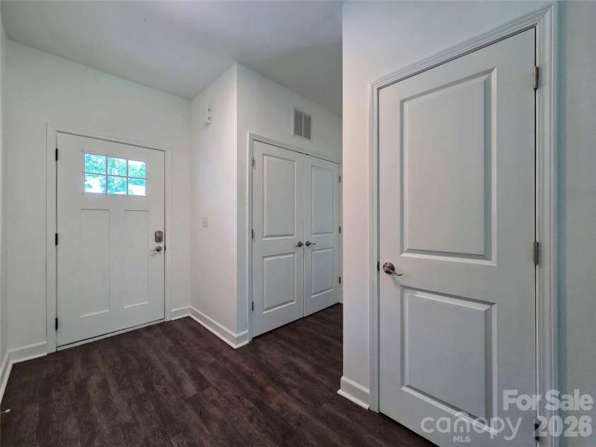 1121 Cleveland Avenue, Gastonia, NC 28052.  MLS# CAR4414991, YatesRealty ID 44562. Entry, Laundry & Coat Closets