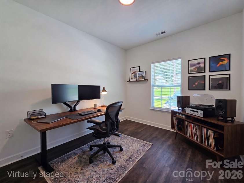 1121 Cleveland Avenue, Gastonia, NC 28052.  MLS# CAR4414991, YatesRealty ID 44562. Front Bedroom (Virtually staged)