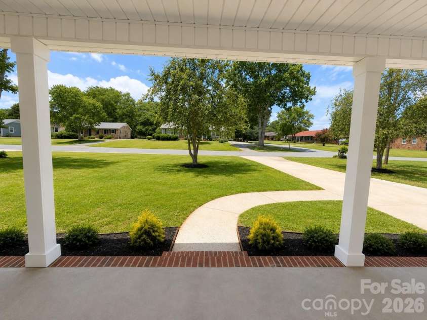2606 Pine Forest Drive, Gastonia, NC 28056.  MLS# CAR4406413, YatesRealty ID 44566. Digitally altered grass