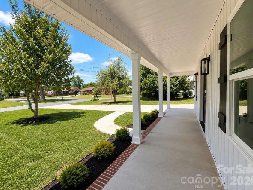 2606 Pine Forest Drive, Gastonia, NC 28056.  MLS# CAR4406413, YatesRealty ID 44566. Digitally altered grass