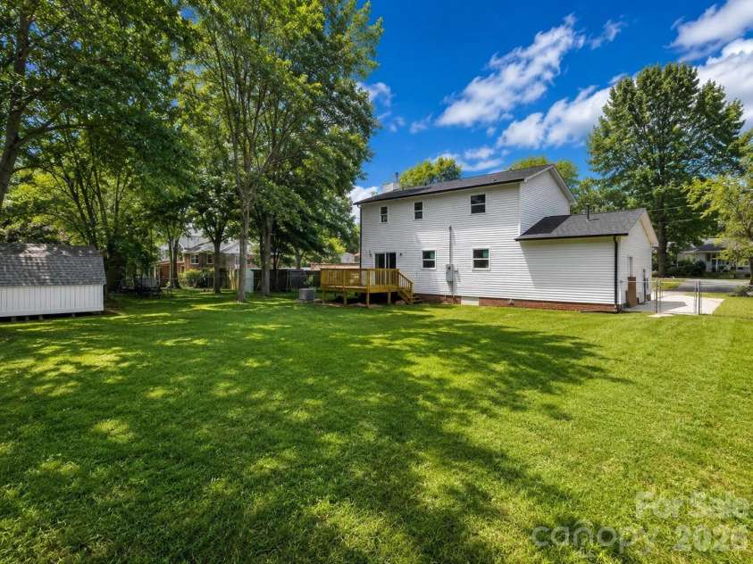 2606 Pine Forest Drive, Gastonia, NC 28056.  MLS# CAR4406413, YatesRealty ID 44566. Digitally altered grass