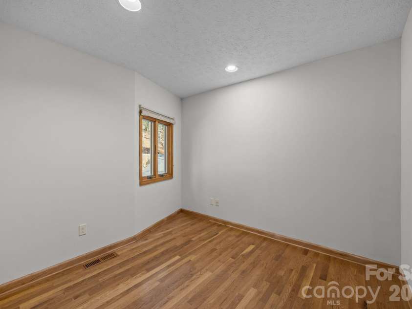 1105 High Vista Drive, Mills River, NC 28759.  MLS# CAR4414362, YatesRealty ID 44568. Main floor office unstaged