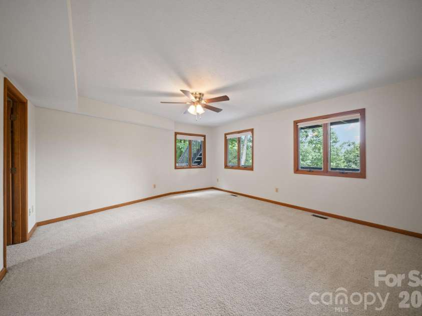 1105 High Vista Drive, Mills River, NC 28759.  MLS# CAR4414362, YatesRealty ID 44568. Unstaged bedroom/flex  in basement 1