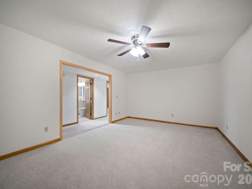 1105 High Vista Drive, Mills River, NC 28759.  MLS# CAR4414362, YatesRealty ID 44568. Unstaged theater/flex in basement