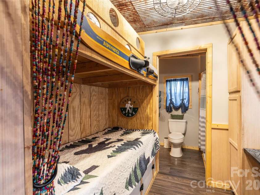 118 Lake Tillery Trail, Mount Gilead, NC 27306.  MLS# CAR4414017, YatesRealty ID 44575. Second Bedroom with Bunk Beds