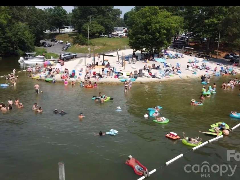 118 Lake Tillery Trail, Mount Gilead, NC 27306.  MLS# CAR4425741, YatesRealty ID 44575. Community Beach