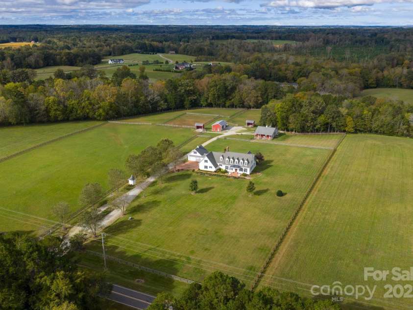 400 Ratledge Road, Mocksville, NC 27028.  MLS# CAR4269651, YatesRealty ID 44577.  A Davie County Equestrian Estate w/Two Parcels totally 14.88 of Equestrian Splendor