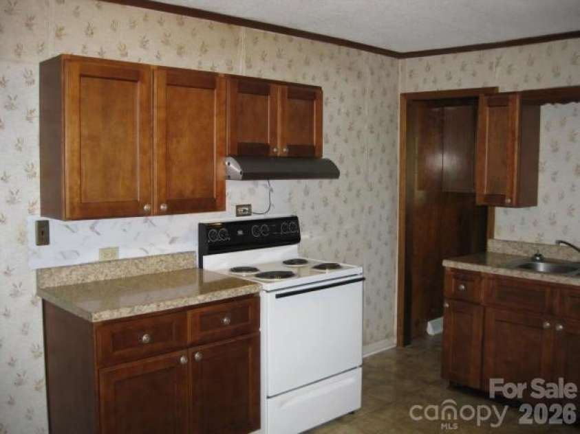 1317 Second Street, Gastonia, NC 28054.  MLS# CAR4414450, YatesRealty ID 44579. 