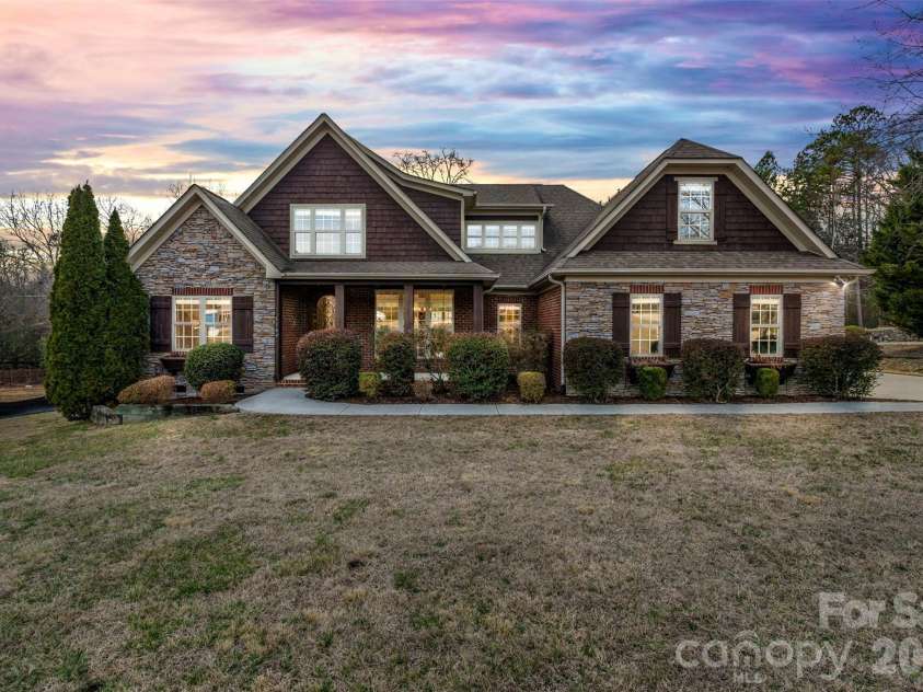 5164 Mill Race Lane, Lancaster, SC 29720.  MLS# CAR4342322, YatesRealty ID 4458. Front (Twilight Color Enhanced)