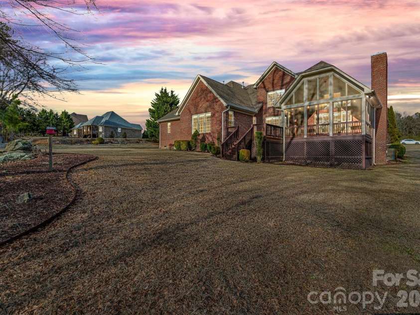 5164 Mill Race Lane, Lancaster, SC 29720.  MLS# CAR4342322, YatesRealty ID 4458. Rear Elevation (Twilight Color Enhanced)