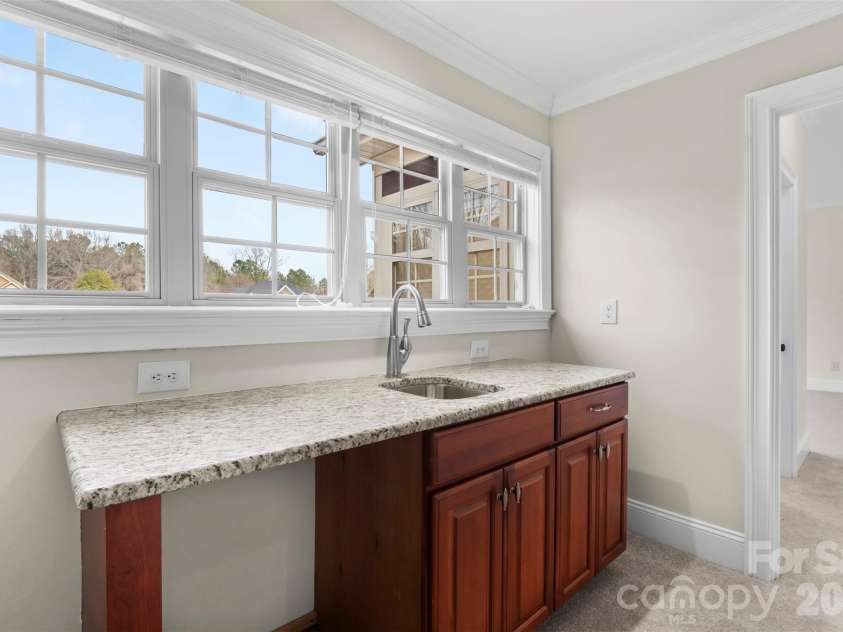 5164 Mill Race Lane, Lancaster, SC 29720.  MLS# CAR4342322, YatesRealty ID 4458. Upstairs Wet Bar with space for beverage cooler