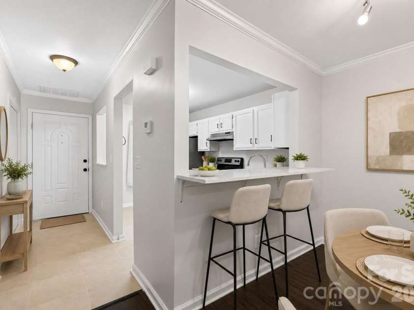 6216 Windsor Gate Lane, Charlotte, NC 28215.  MLS# CAR4412829, YatesRealty ID 44596. Virtually staged to show potential