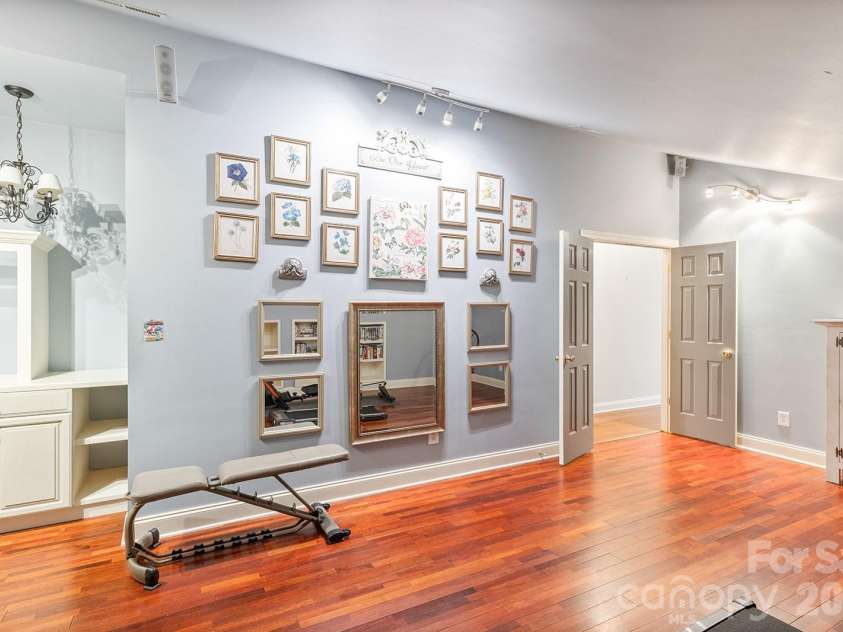 2310 Keara Way, Charlotte, NC 28270.  MLS# CAR4314530, YatesRealty ID 4460. The bar in the media/bonus room alcove area can accommodate a fridge like the one in the family room bar