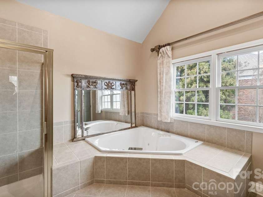 2310 Keara Way, Charlotte, NC 28270.  MLS# CAR4314530, YatesRealty ID 4460. Tub in primary has jets and heater, so the water stays to temperature the whole time