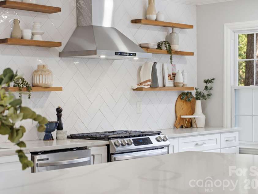8323 Cliffside Drive, Charlotte, NC 28270.  MLS# CAR4413932, YatesRealty ID 44601. Entertainer's dream kitchen