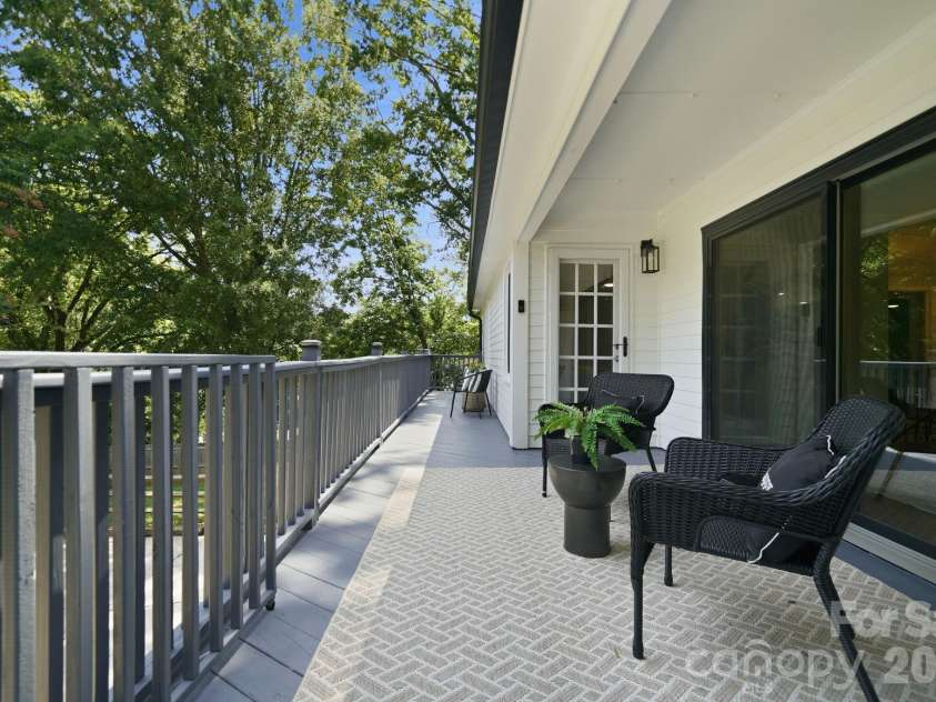8323 Cliffside Drive, Charlotte, NC 28270.  MLS# CAR4413932, YatesRealty ID 44601. Large deck on back of upper level