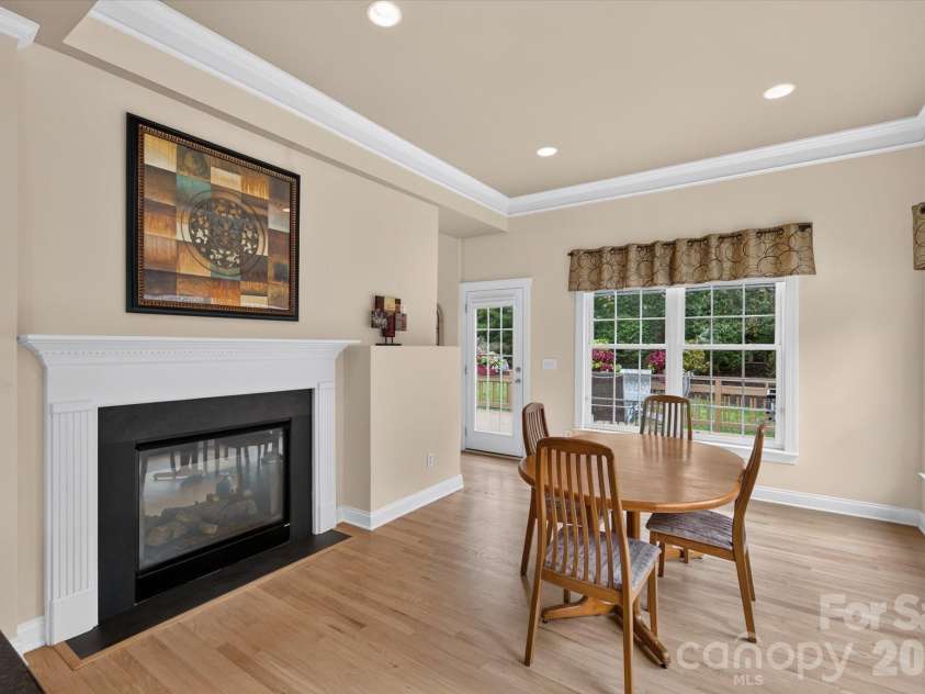 8306 Denholme Drive, Waxhaw, NC 28173.  MLS# CAR4413160, YatesRealty ID 44605. Breakfast nook with fireplace
