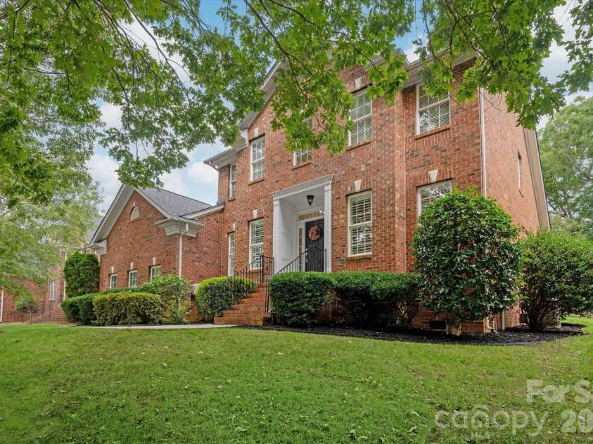 8306 Denholme Drive, Waxhaw, NC 28173.  MLS# CAR4413160, YatesRealty ID 44605. Full brick home