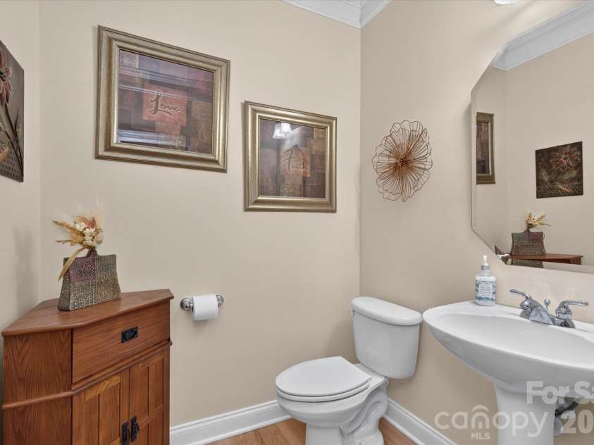 8306 Denholme Drive, Waxhaw, NC 28173.  MLS# CAR4413160, YatesRealty ID 44605. Half bathroom