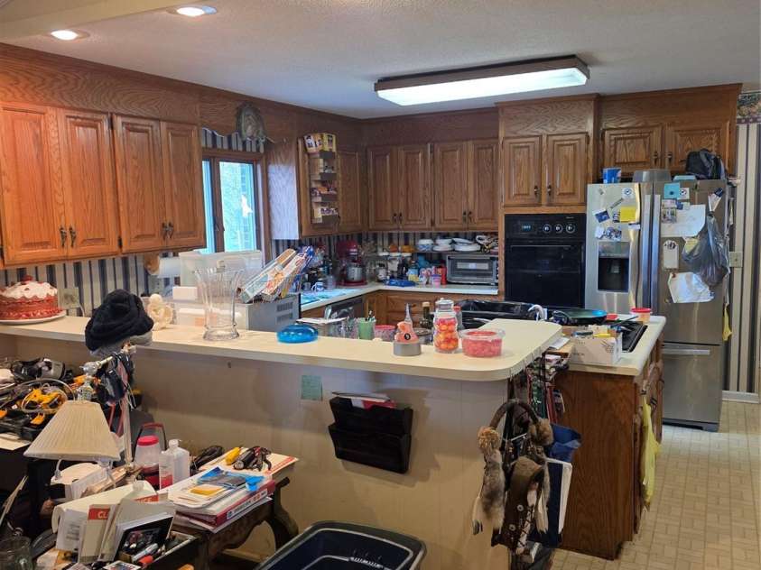 350 Morningstar Lake Road, Forest City, NC 28043.  MLS# CAR4340237, YatesRealty ID 4461. Den looking into kitchen