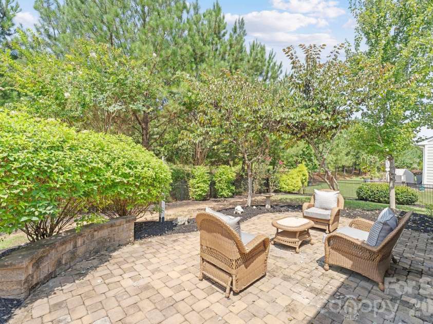 6948 Sunset Crater Place, Lancaster, SC 29720.  MLS# CAR4413356, YatesRealty ID 44612. Paved backyard patio