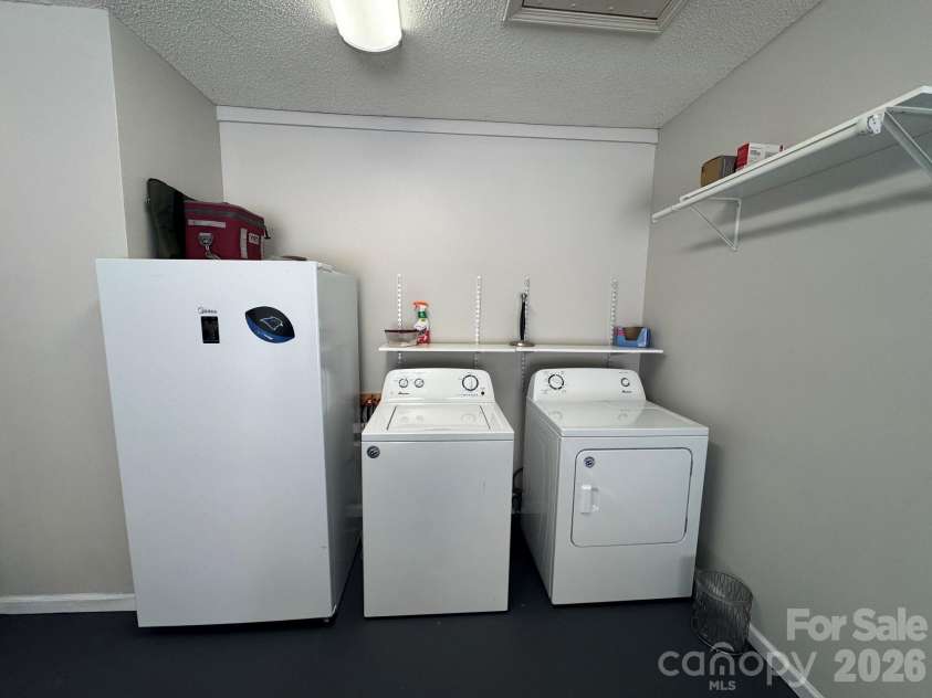 501 Independence Trail, Morganton, NC 28655.  MLS# CAR4413269, YatesRealty ID 44614. Laundry area
