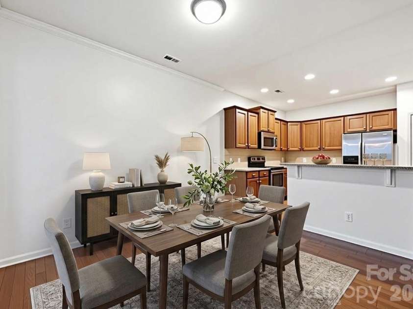 1040 Mesa Verde Drive, Fort Mill, SC 29707.  MLS# CAR4407477, YatesRealty ID 44615. Furniture virtually added to dining area