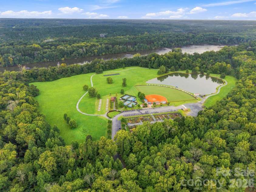 1040 Mesa Verde Drive, Fort Mill, SC 29707.  MLS# CAR4407477, YatesRealty ID 44615. Softball and Pickleball at the River