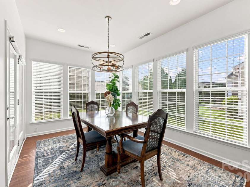 1040 Mesa Verde Drive, Fort Mill, SC 29707.  MLS# CAR4407477, YatesRealty ID 44615. Sunroom currently used as a dining room