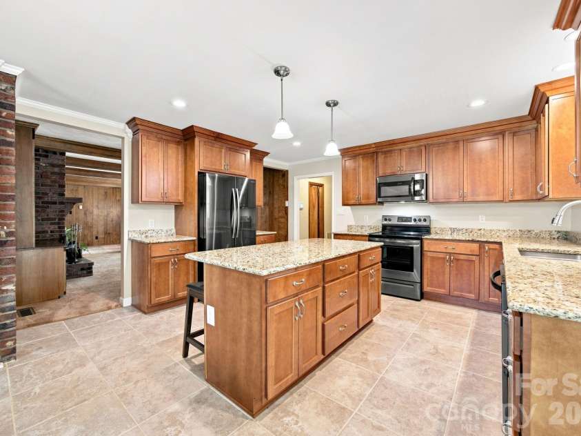 1285 Patterson Street, China Grove, NC 28023.  MLS# CAR4410230, YatesRealty ID 44618. Large kitchen features all stainless appliances