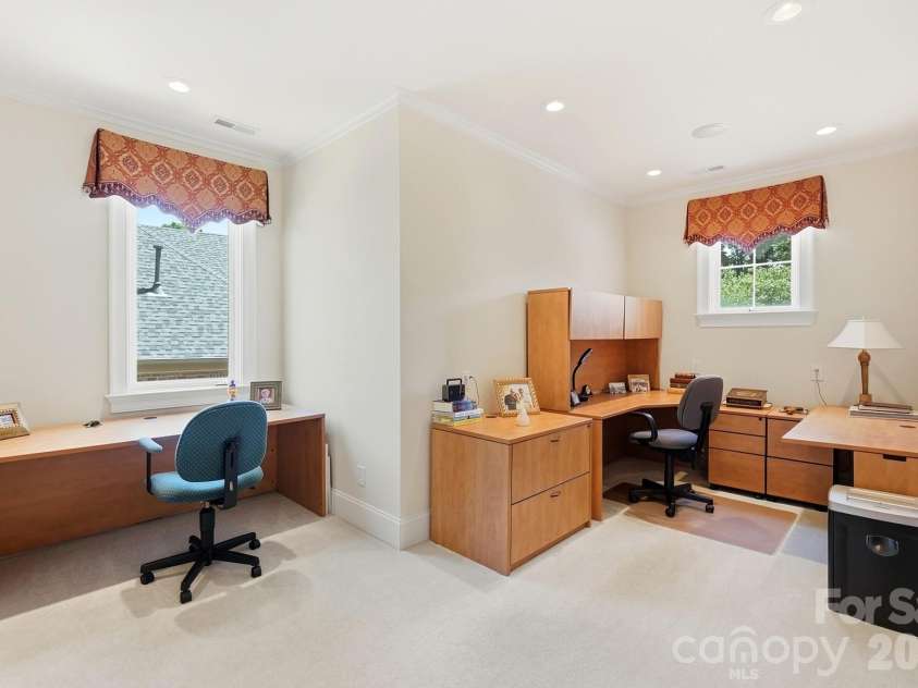 20124 Bascom Ridge Drive, Cornelius, NC 28031.  MLS# CAR4408389, YatesRealty ID 44623. An additional upper-level room provides valuable flexibility for a second office, study, hobby room, or homework space. Two windows, generous floor area, and a quiet location make it well-suited for a variety of u