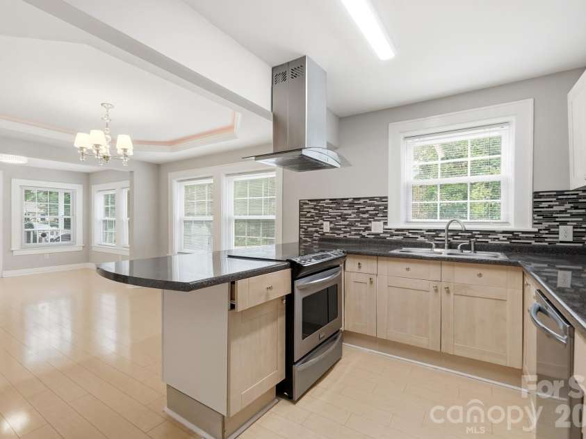 3717 Margaret Wallace Road, Matthews, NC 28105.  MLS# CAR4414896, YatesRealty ID 44632. 