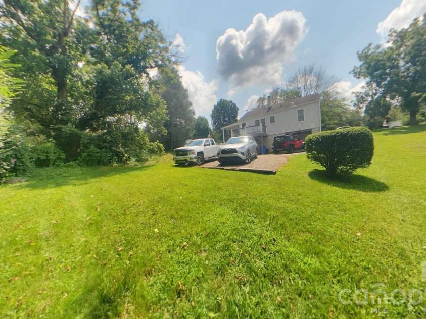214 Governors View Road, Asheville, NC 28805.  MLS# CAR4413776, YatesRealty ID 44636. Back Yard
