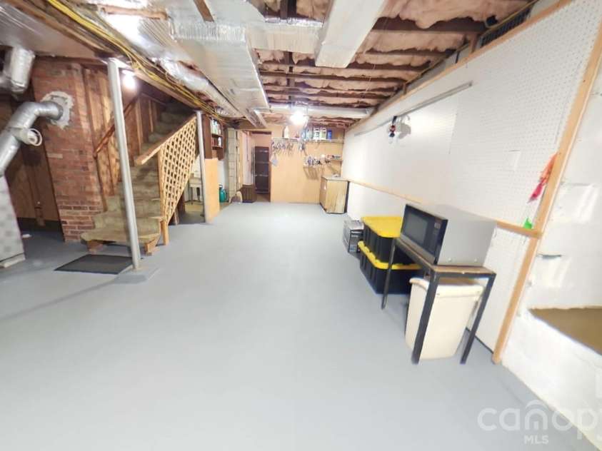 214 Governors View Road, Asheville, NC 28805.  MLS# CAR4413776, YatesRealty ID 44636. Basement